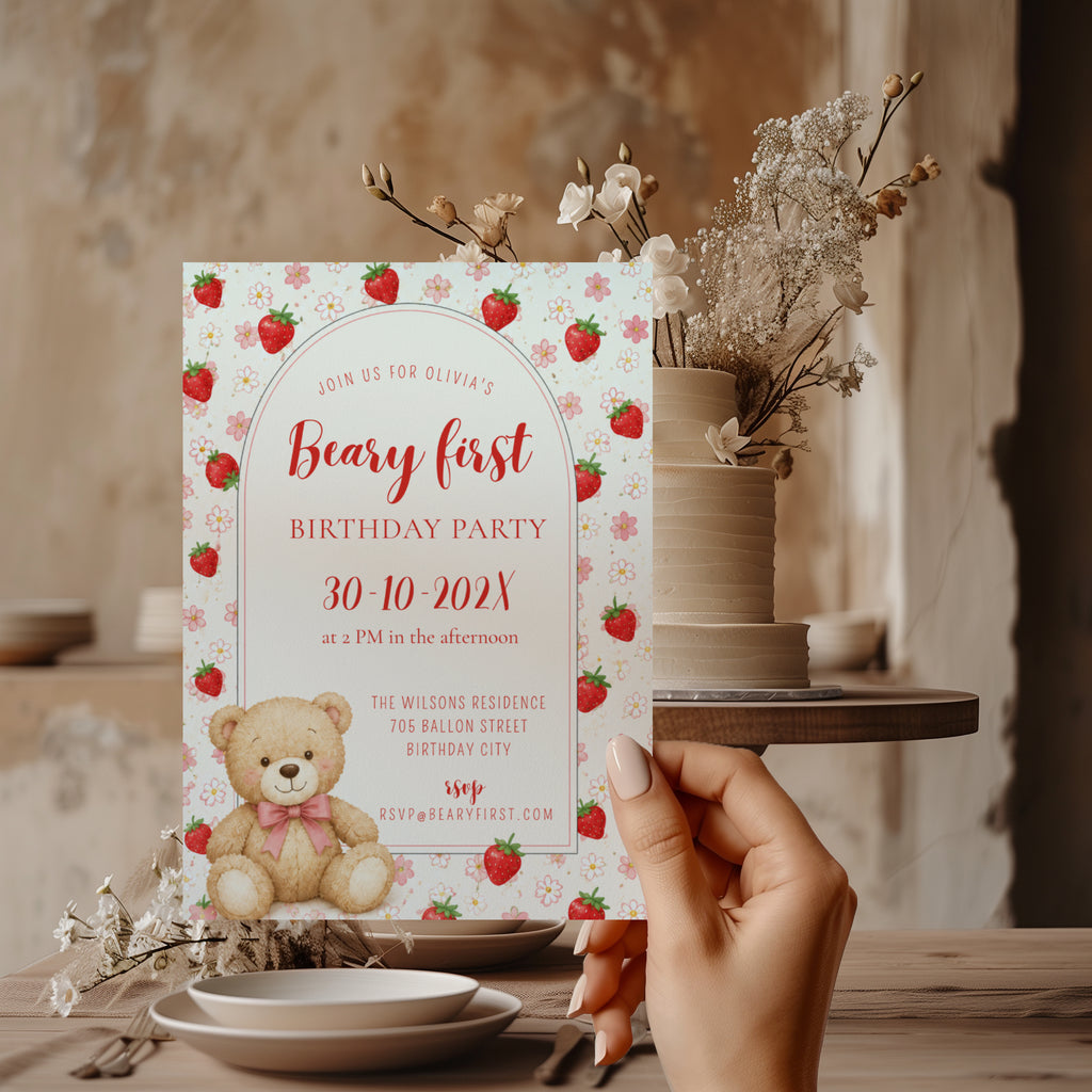 Editable Berry & Beary First birthday invitation with a teddy bear, strawberries, pink flowers, and an elegant arched design for a girl's first birthday party.