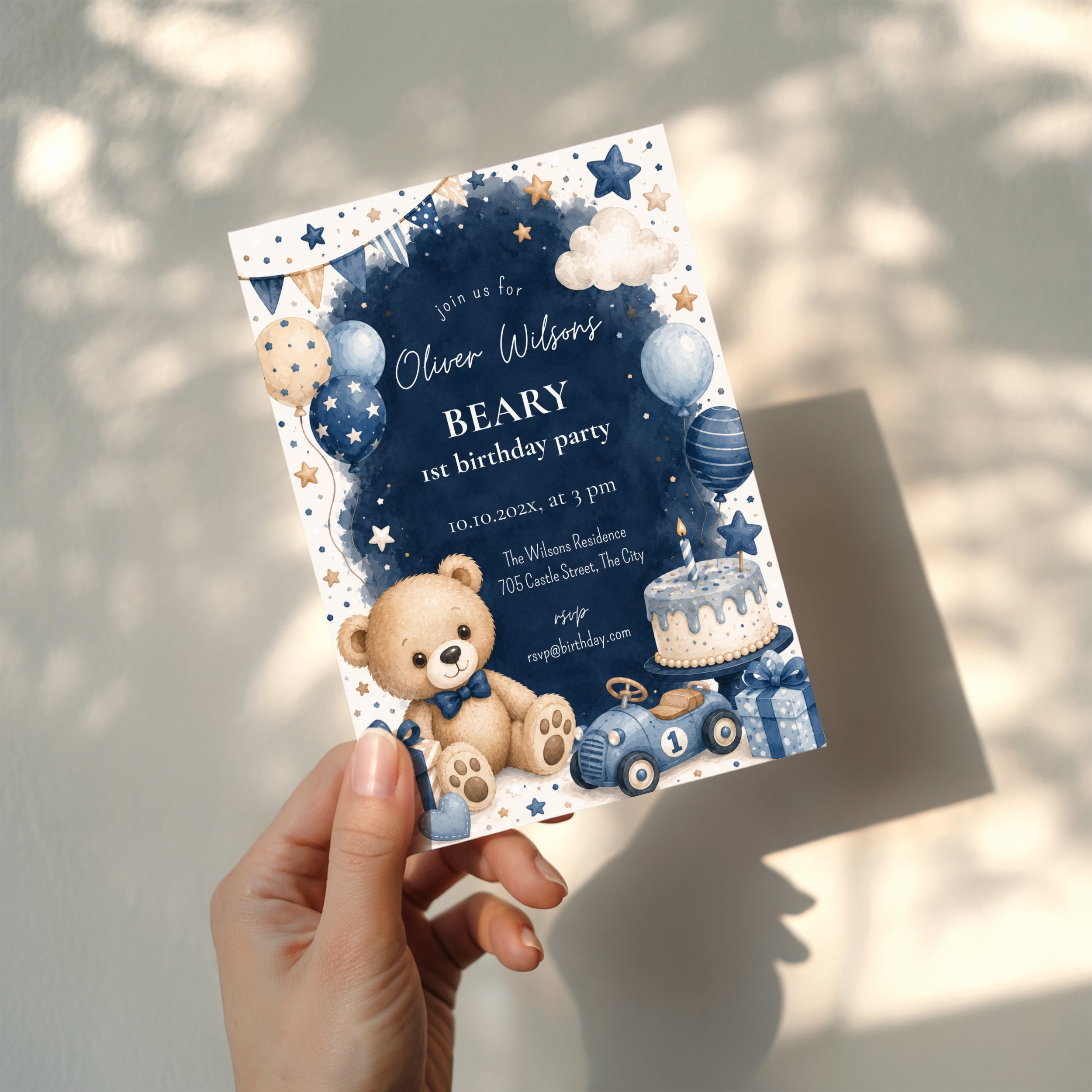 Classic Beary First birthday invitation featuring a teddy bear, blue balloons, birthday cake, vintage toy race car, and watercolor stars for a baby boy's first birthday.