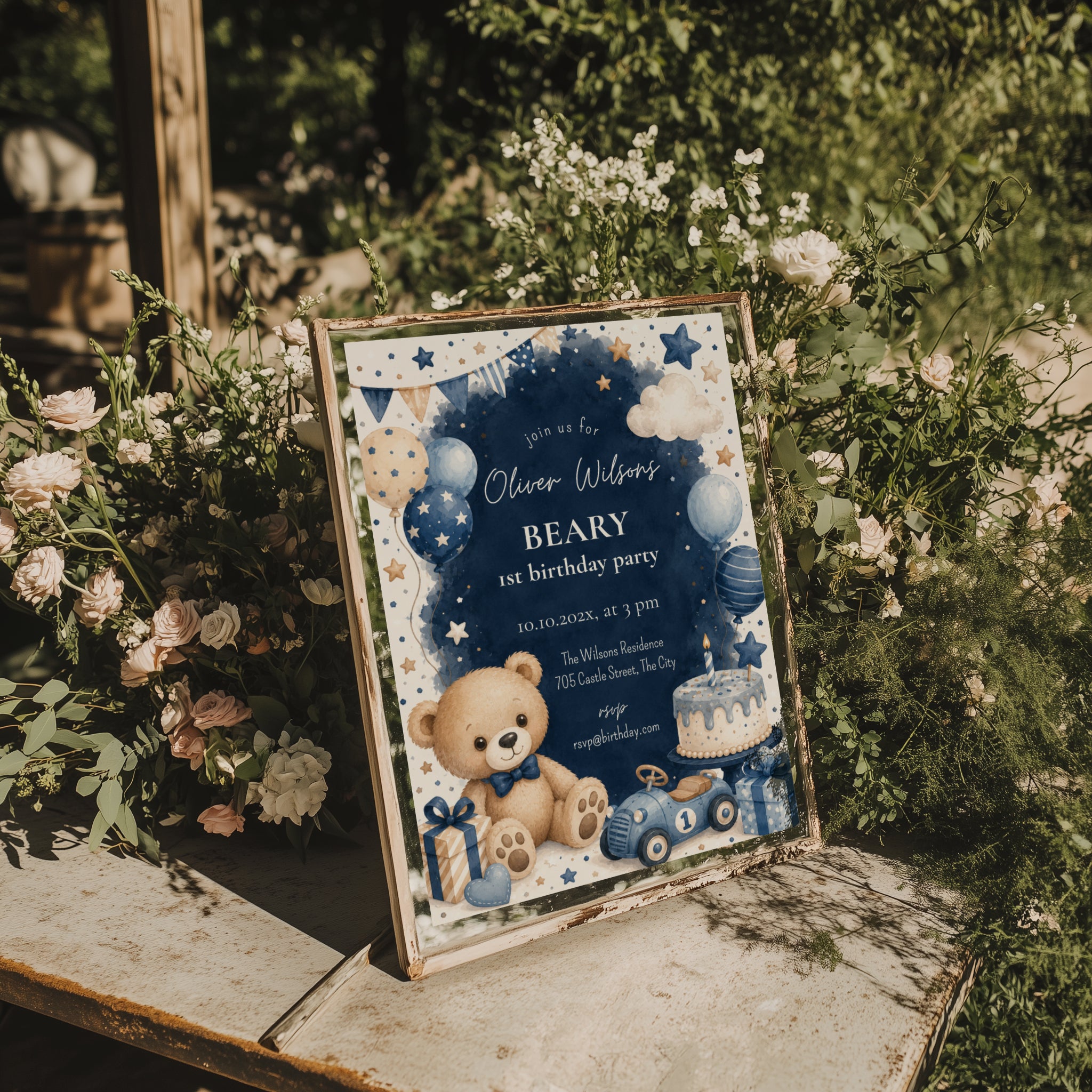 Classic Beary First birthday invitation featuring a teddy bear, blue balloons, birthday cake, vintage toy race car, and watercolor stars for a baby boy's first birthday.
