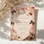 Coquette birthday party invitation featuring pink satin bows, pearls, perfume bottles, cherries, roses, and leopard print accents in an elegant blush aesthetic.