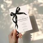 Black bow 21st birthday invitation with an oversized satin ribbon, minimalist black typography, and an elegant white layout for a milestone celebration.
