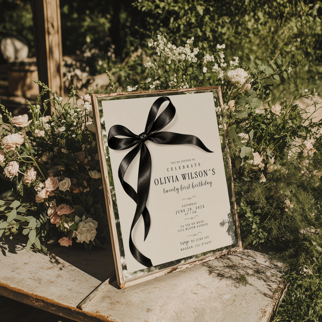 Black bow 21st birthday invitation with an oversized satin ribbon, minimalist black typography, and an elegant white layout for a milestone celebration.