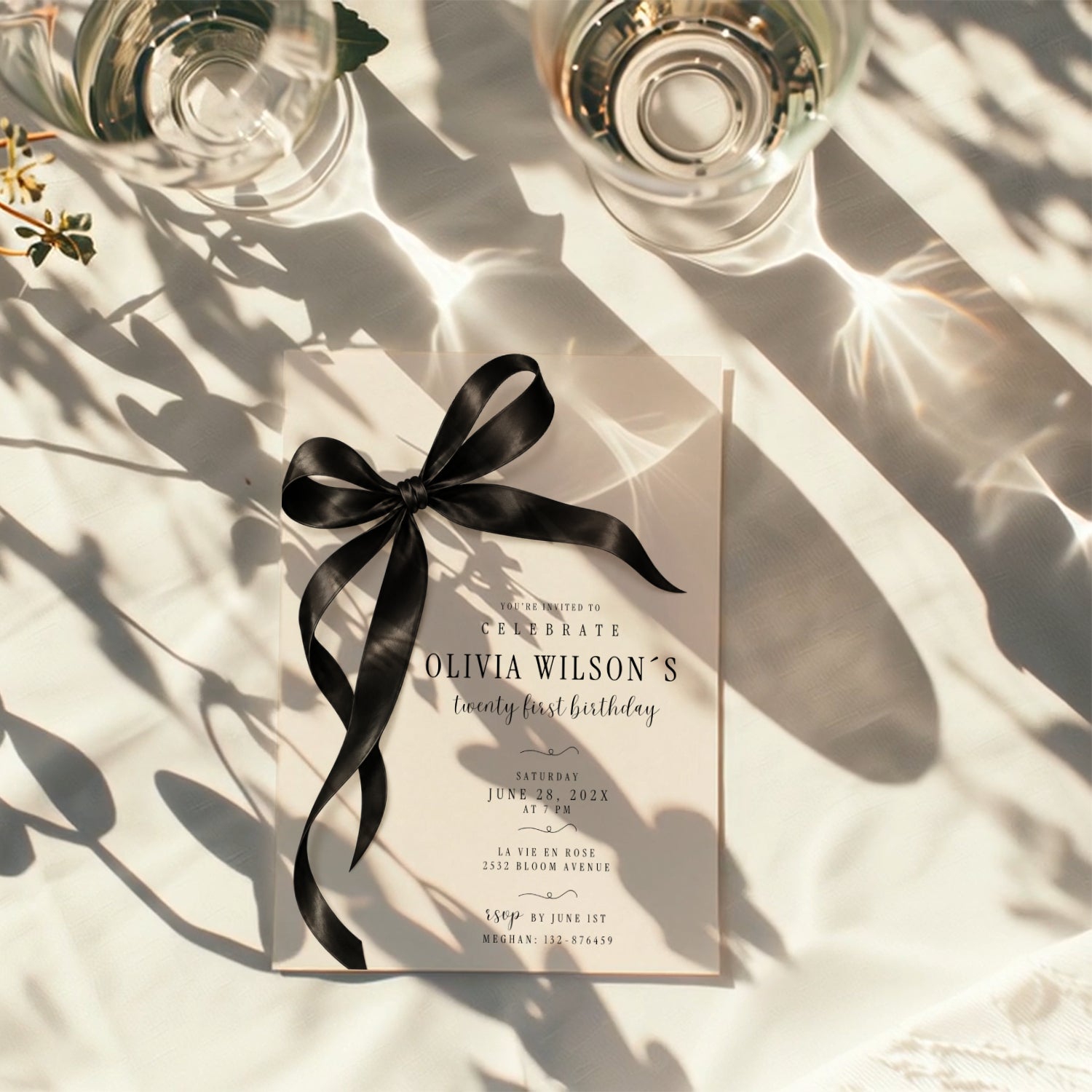 Black bow 21st birthday invitation with an oversized satin ribbon, minimalist black typography, and an elegant white layout for a milestone celebration.