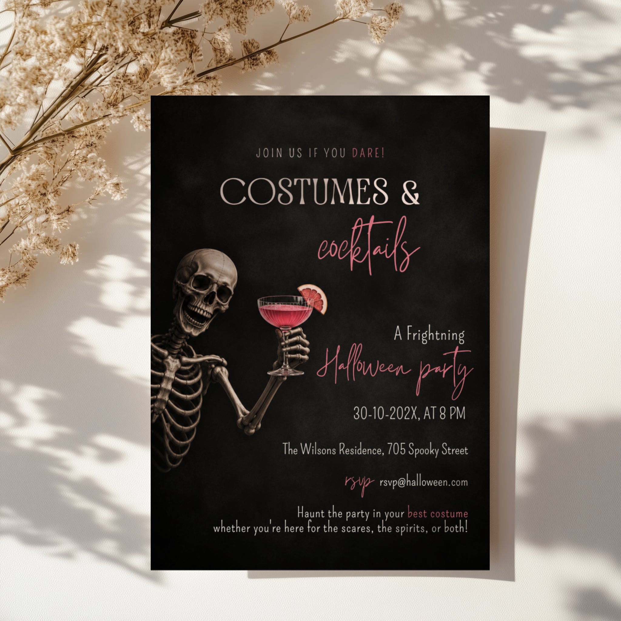 Costumes and Cocktails Halloween party invitation with a skeleton holding a pink cocktail, bold black background, and hot pink typography.