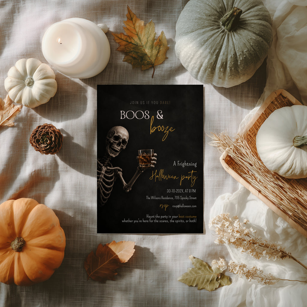 Boos and Booze Halloween party invitation featuring a skeleton holding a whiskey glass, black background, and amber typography for an adult Halloween party.