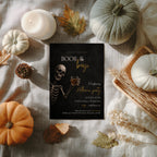 Boos and Booze Halloween party invitation featuring a skeleton holding a whiskey glass, black background, and amber typography for an adult Halloween party.