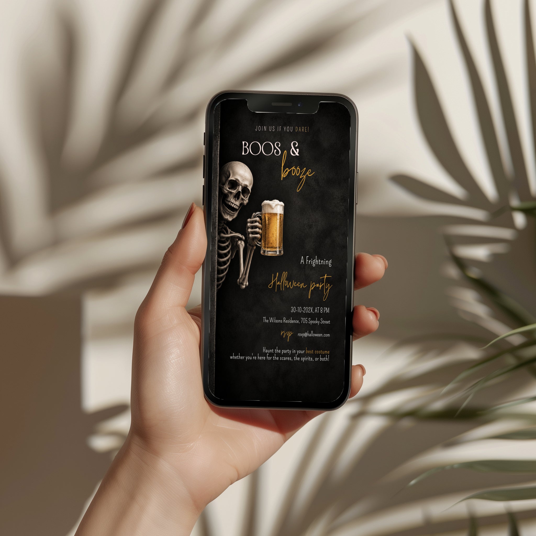 Skeleton beer Halloween party invitation with a grinning skeleton holding a frosty beer and a dark Boos & Booze party design with amber lettering.