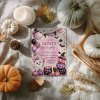 Pink Halloween birthday party invitation with a cute ghost, pink and purple pumpkins, witch hats, bats, balloons, and whimsical watercolor details.
