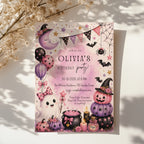 Pink Halloween birthday party invitation with a cute ghost, pink and purple pumpkins, witch hats, bats, balloons, and whimsical watercolor details.
