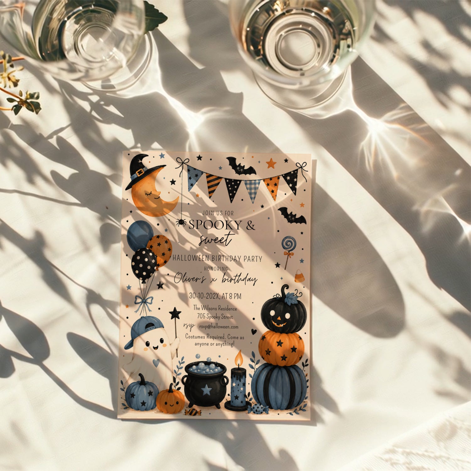 Boys Halloween birthday party invitation with a cute ghost, orange and navy pumpkins, bats, balloons, candy, and playful spooky party details.