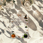Halloween costume party invitation with ghost, witch hat, spider, skull, orange jack-o'-lantern and bubbling green cauldron illustrations.