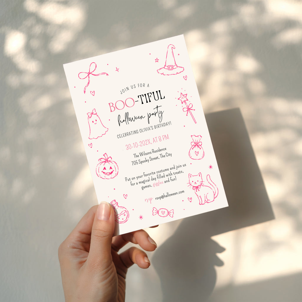 Boo-tiful pink Halloween birthday invitation with ghost, witch hat, magic wand, bow pumpkin, black cat, candy and potion illustrations.