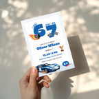 6 7 birthday invitation with bold blue 67 numbers, blue race car, checkered flags, flaming tire and trophy details for a racing 7th birthday party.