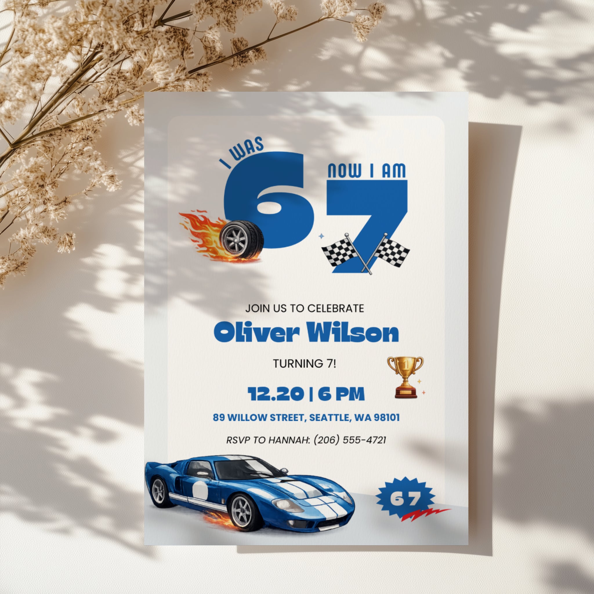 6 7 birthday invitation with bold blue 67 numbers, blue race car, checkered flags, flaming tire and trophy details for a racing 7th birthday party.