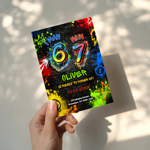 6 7 birthday invitation with colorful 67 numbers, bright graffiti paint splashes, neon colors, crown, stars and lightning details on a black background.