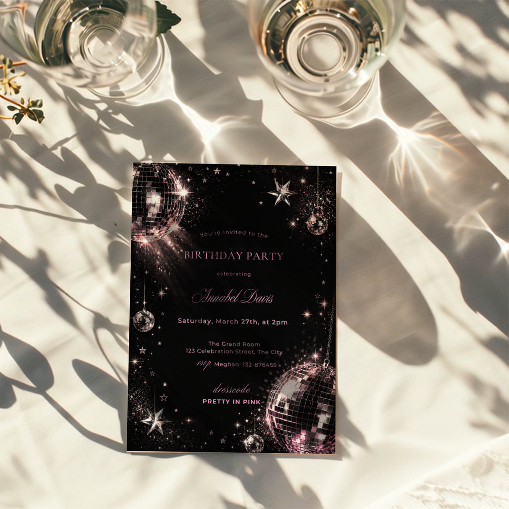 Black and pink disco birthday invitation with shimmering disco balls, sparkling stars and glamorous dark party details.