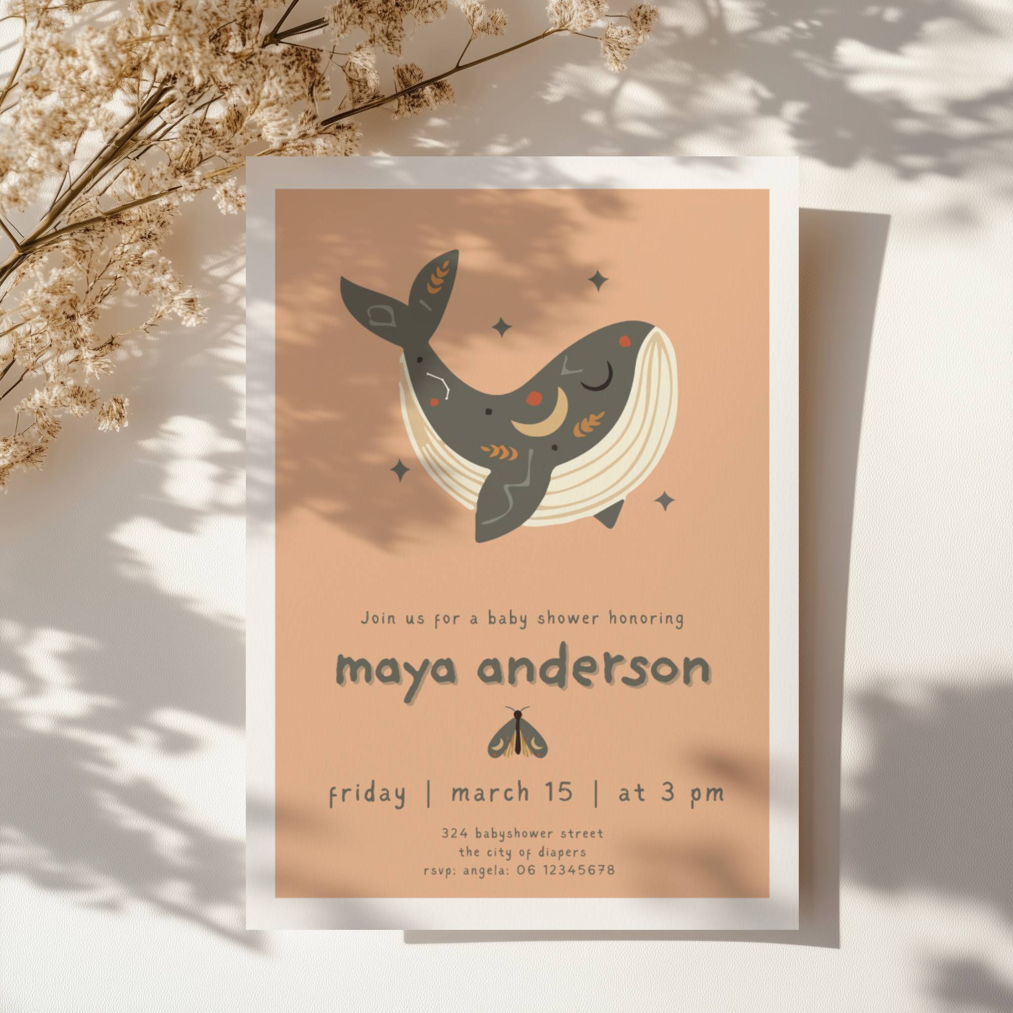 boho whale baby shower invitation with earthy tones and soft pink accents