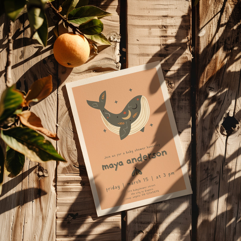 boho whale baby shower invitation with earthy tones and soft pink accents