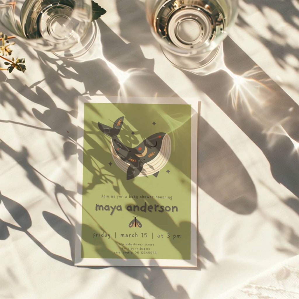 boho whale baby shower invitation in soft green tones with playful typography and celestial details