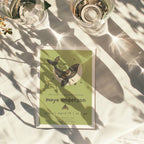 boho whale baby shower invitation in soft green tones with playful typography and celestial details