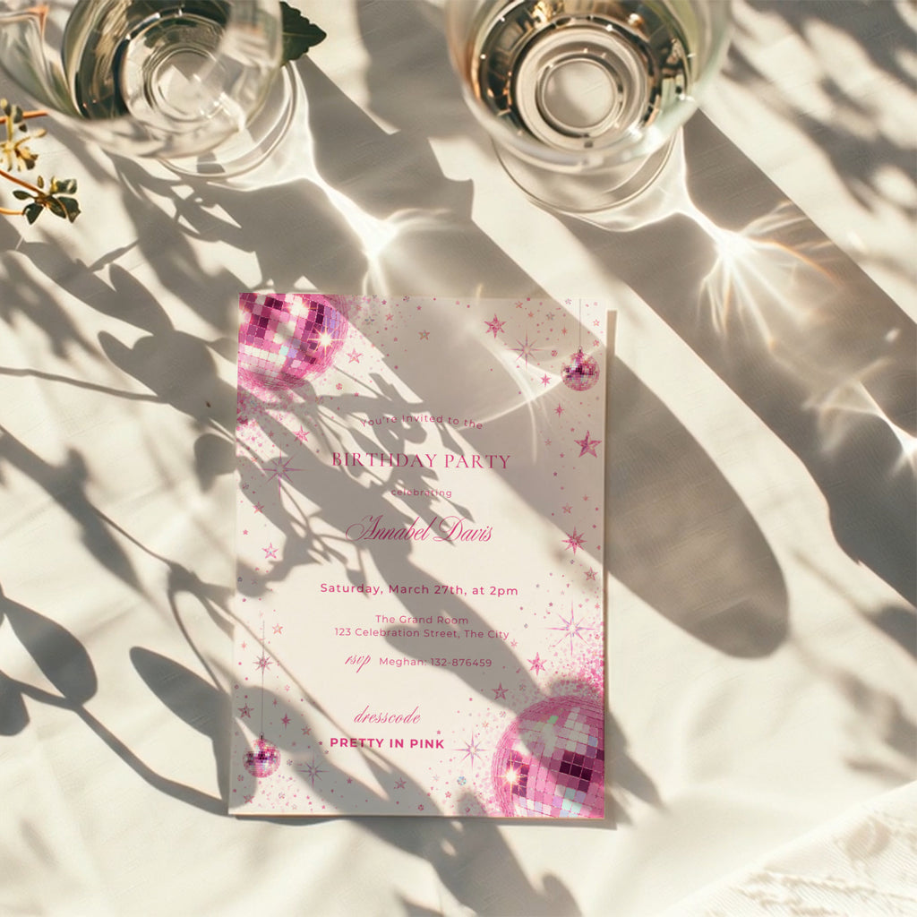 Pink disco birthday invitation with sparkling pink disco balls, glitter details, stars and Pretty in Pink dress code for a glamorous birthday party.