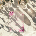Pink disco birthday invitation with sparkling pink disco balls, glitter details, stars and Pretty in Pink dress code for a glamorous birthday party.