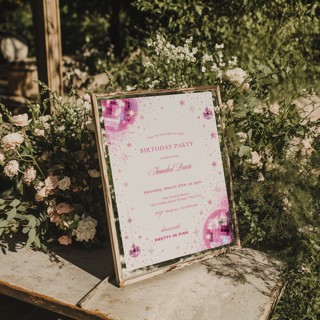 Pink disco birthday invitation with sparkling pink disco balls, glitter details, stars and Pretty in Pink dress code for a glamorous birthday party.