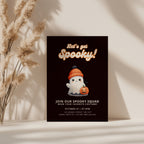 cute spooky halloween party invitation with ghost in beanie and pumpkin illustration
