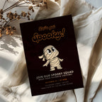 cute mummy halloween party invitation with cartoon character and dark background