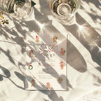 christmas baby shower invitation with cute gingerbread characters and festive red accents