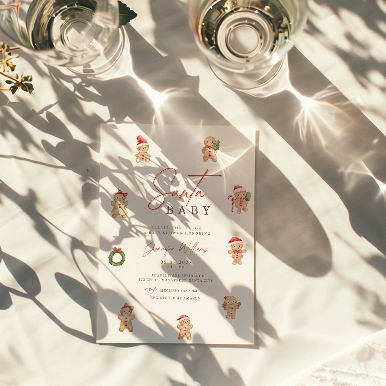christmas baby shower invitation with cute gingerbread characters and festive red accents
