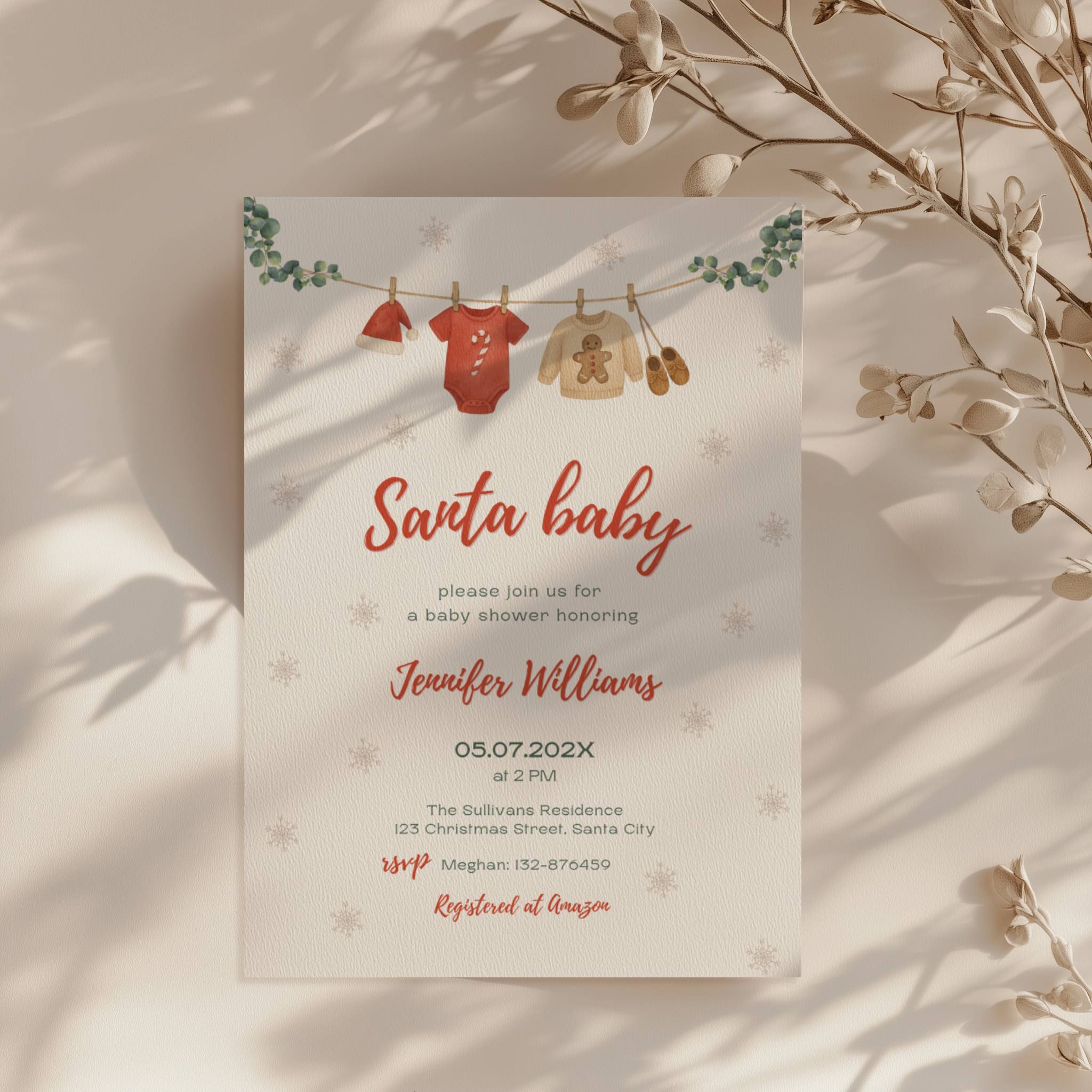 santa baby shower invitation with clothesline illustration and winter snowflake background