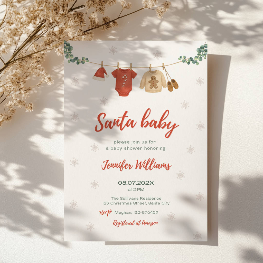 santa baby shower invitation with clothesline illustration and winter snowflake background