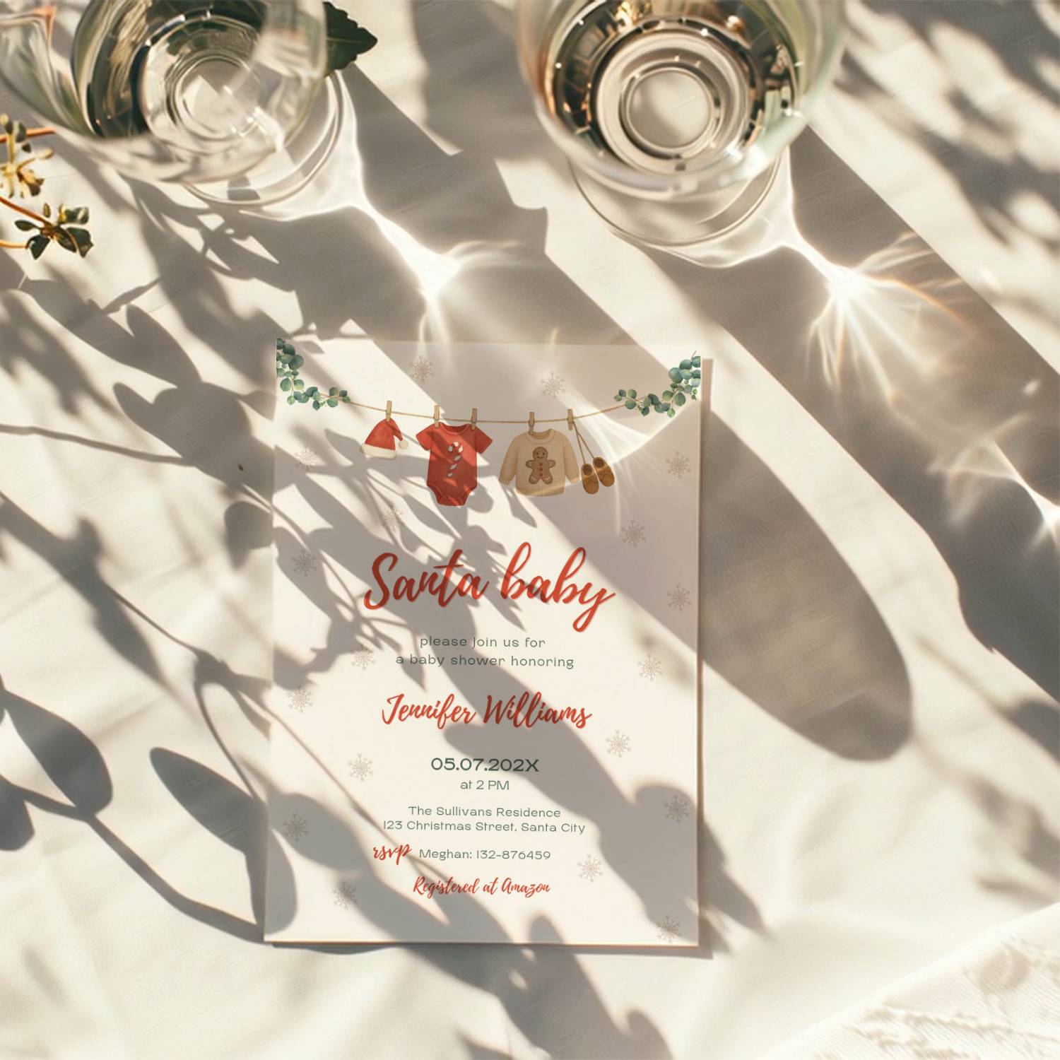 santa baby shower invitation with clothesline illustration and winter snowflake background
