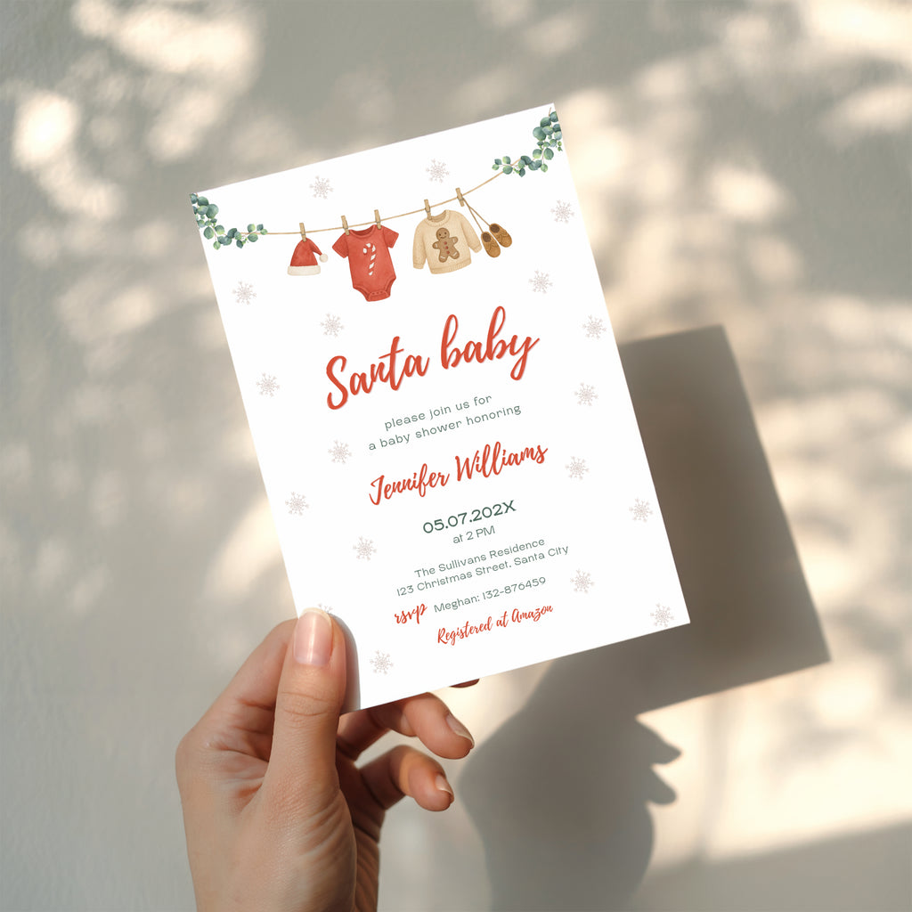 santa baby shower invitation with clothesline illustration and winter snowflake background