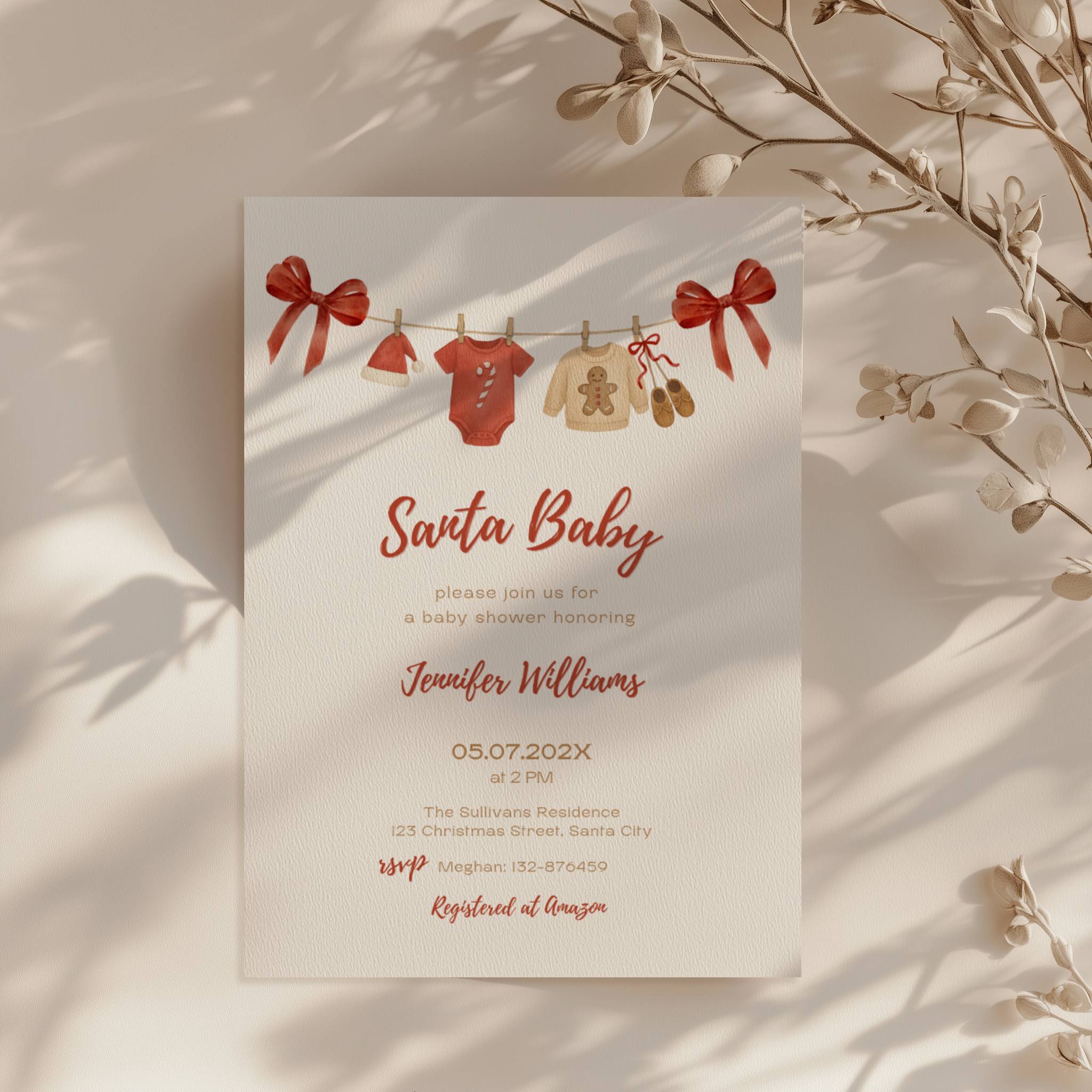 santa baby shower invitation with red bows and watercolor baby clothesline illustration