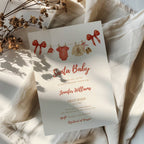 santa baby shower invitation with red bows and watercolor baby clothesline illustration