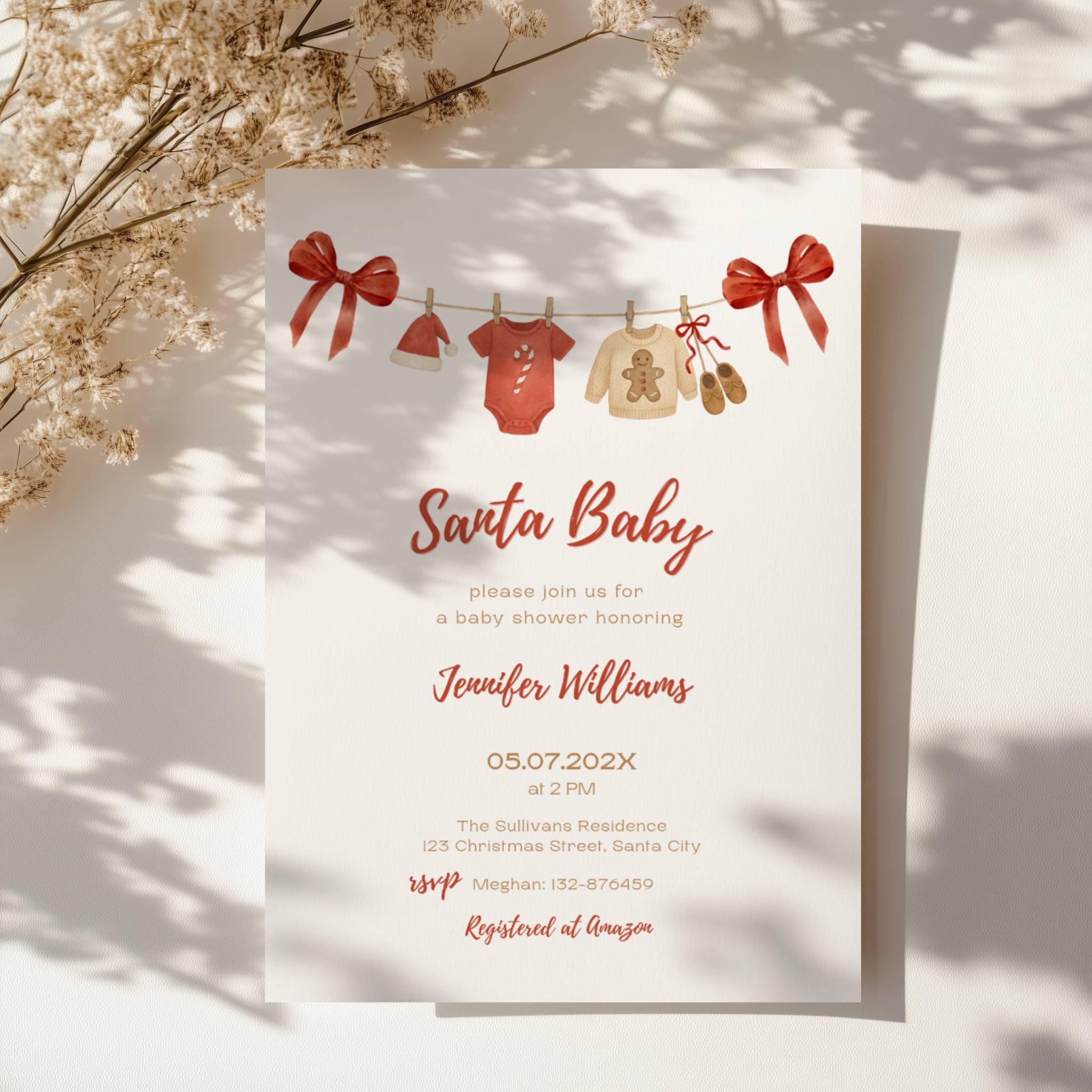 santa baby shower invitation with red bows and watercolor baby clothesline illustration