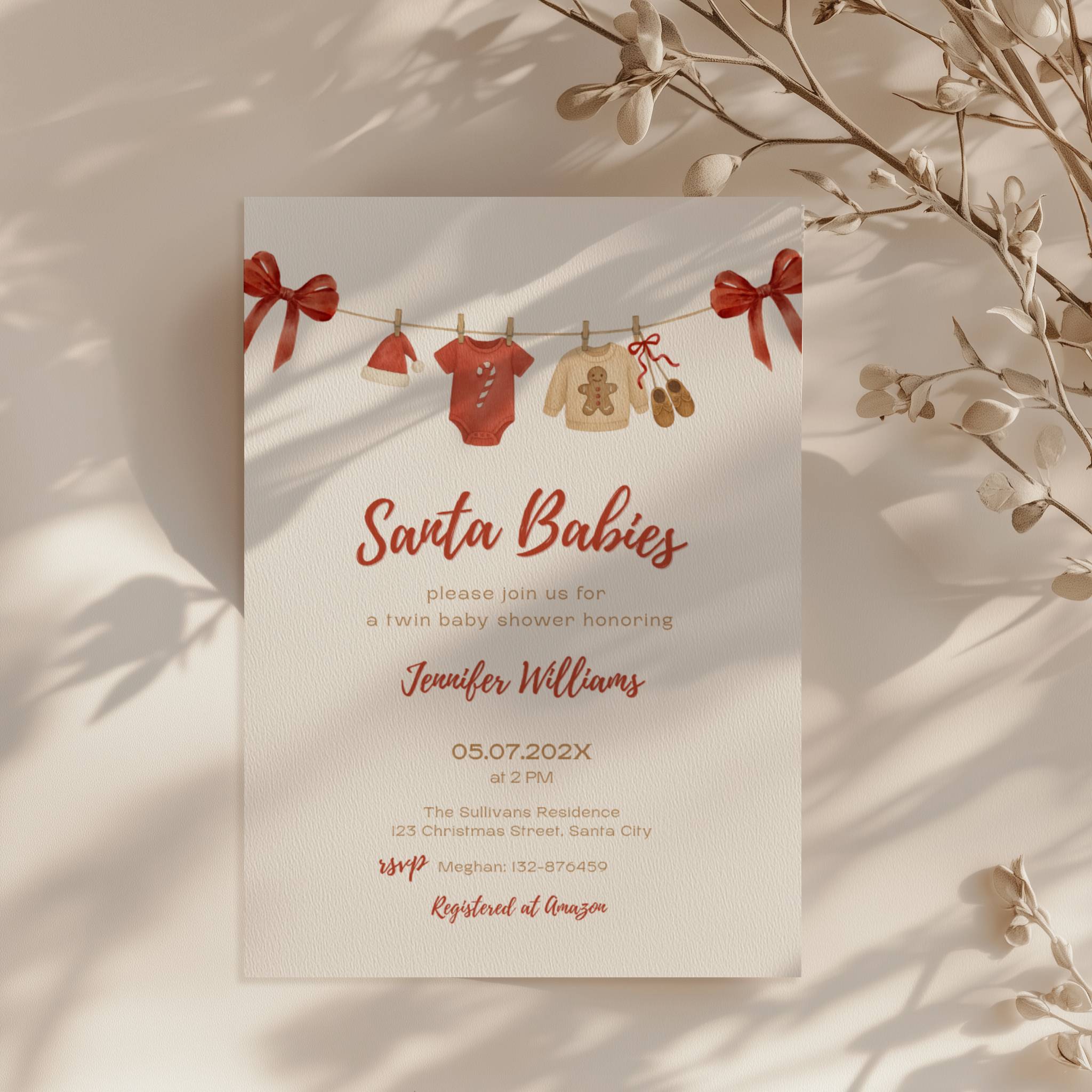 twin santa baby shower invitation with red bows and watercolor baby clothesline illustration