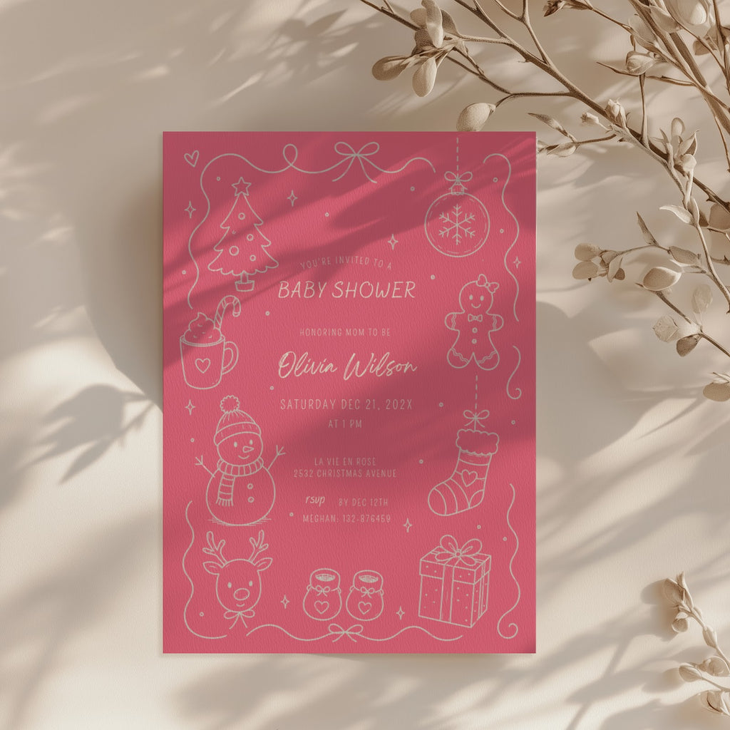 Christmas baby shower invitation with soft pink winter design for a festive celebration