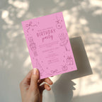 Christmas birthday party invitation with pink nutcracker ballerina illustration for a festive winter celebration