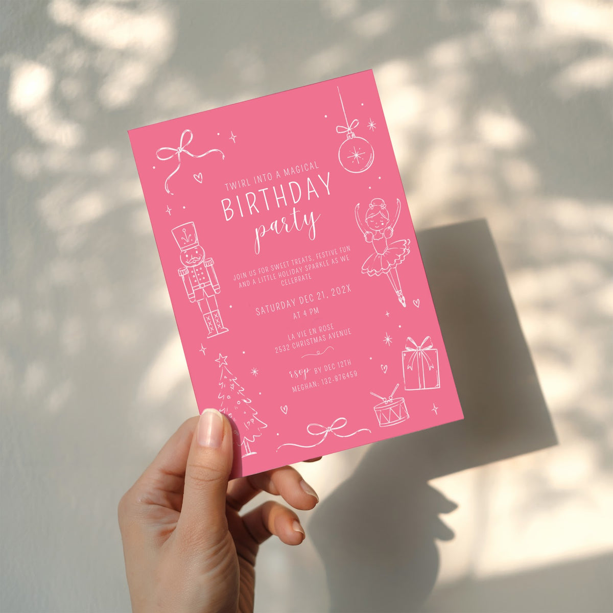 Christmas birthday party invitation with pink nutcracker ballerina illustration and white text for a festive winter celebration