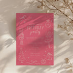 Christmas birthday party invitation with pink nutcracker ballerina illustration and white text for a festive winter celebration