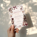 Christmas party invitation with elegant burgundy design for a sophisticated holiday celebration