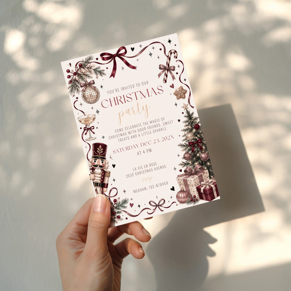Christmas party invitation with elegant burgundy design for a sophisticated holiday celebration