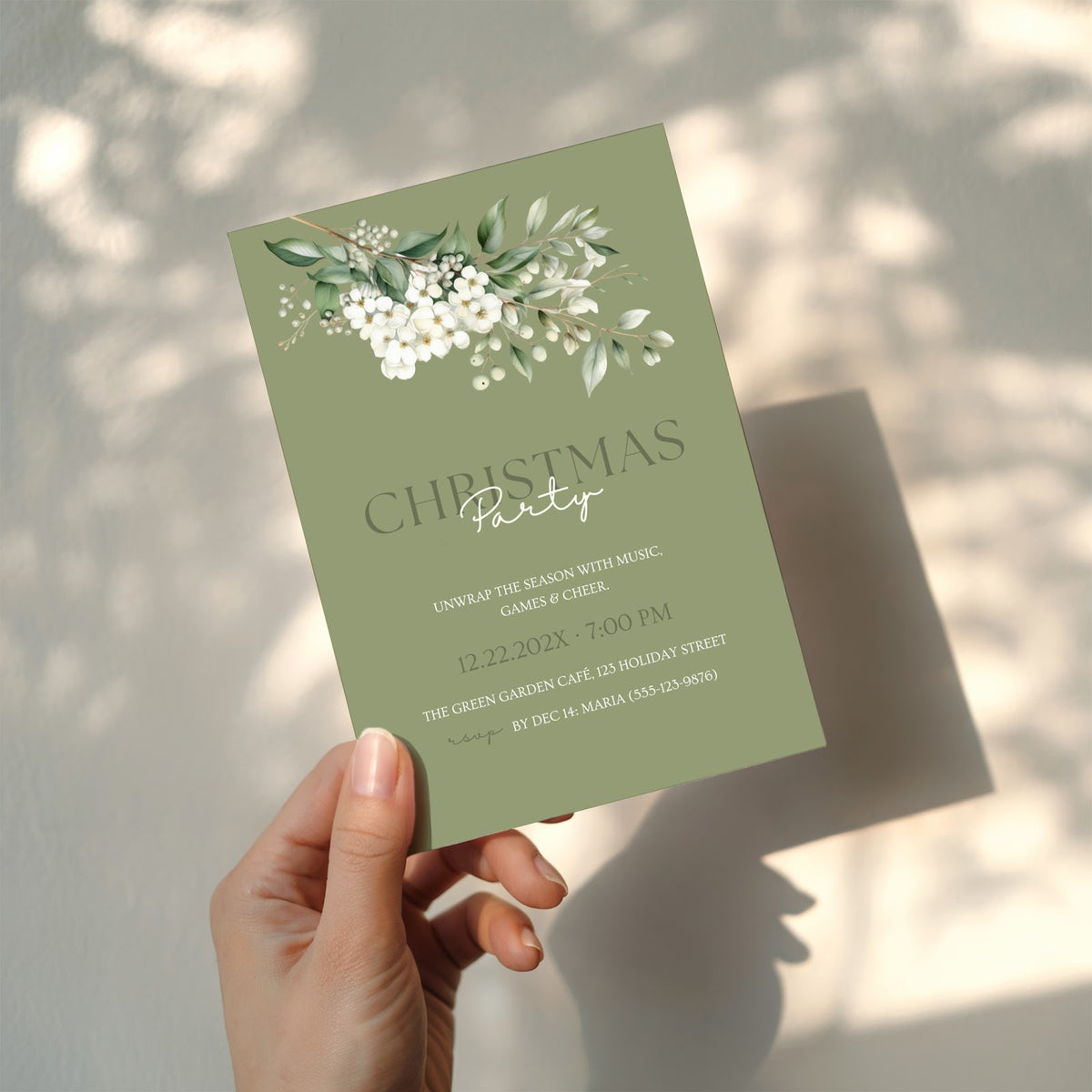 Christmas party invitation with elegant sage green floral design for a festive holiday celebration
