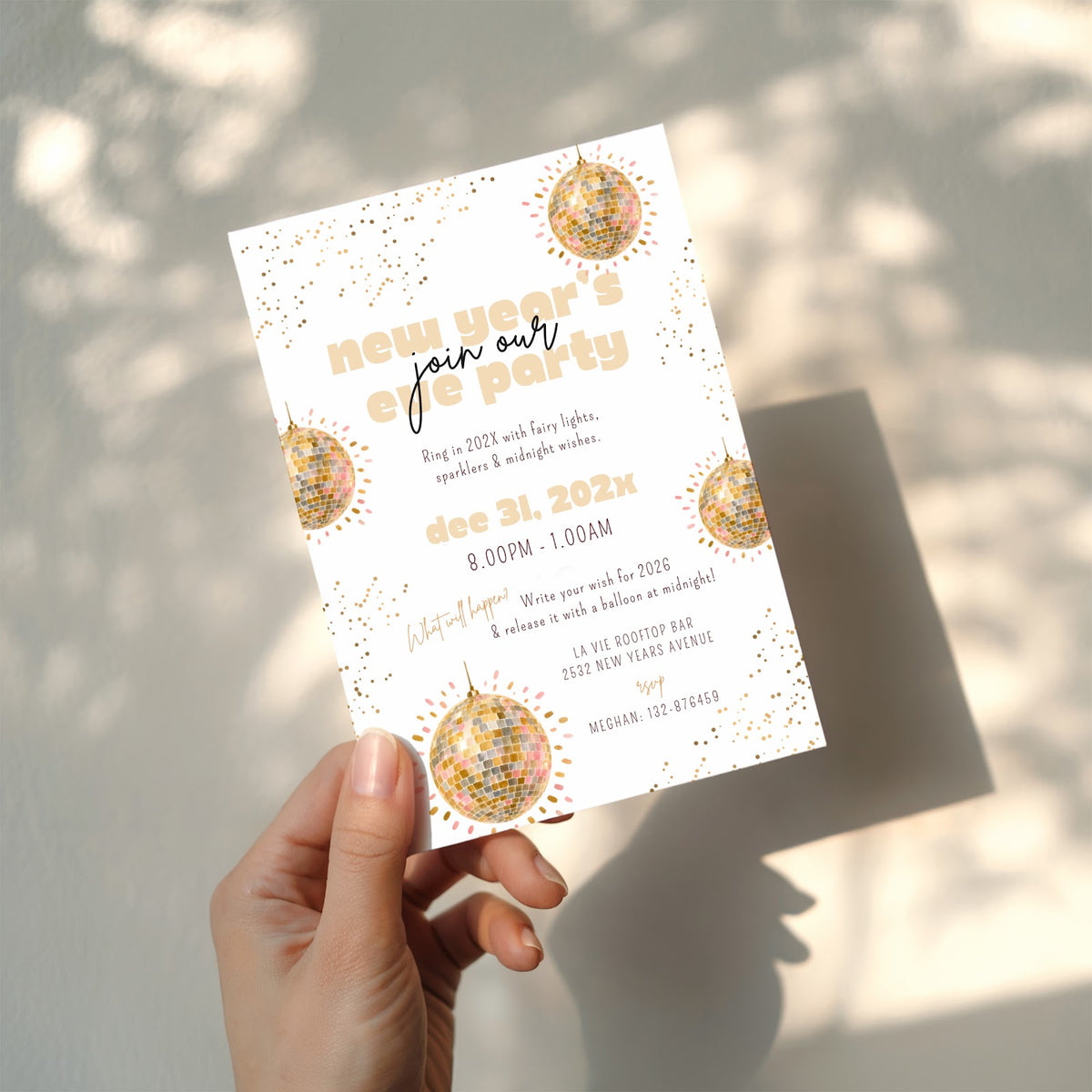 New Years Eve party invitation with gold disco ball design for a glamorous celebration
