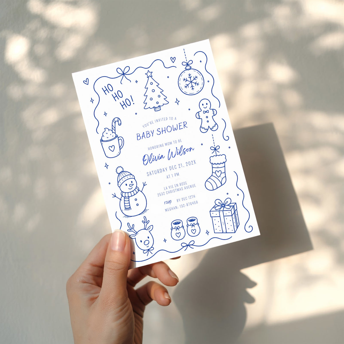 Santa baby shower invitation with playful doodle illustration for a festive celebration