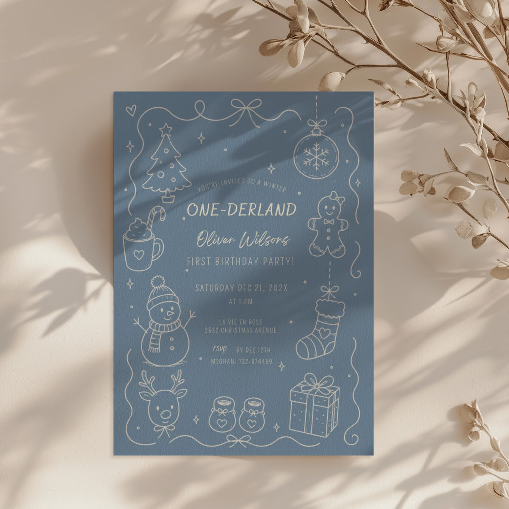 Winter ONEderland first birthday invitation with soft blue design for a winter celebration